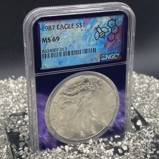 1987 $1 American Silver Eagle NGC MS69 Rare Purple Holder Trader Bea Private Issue