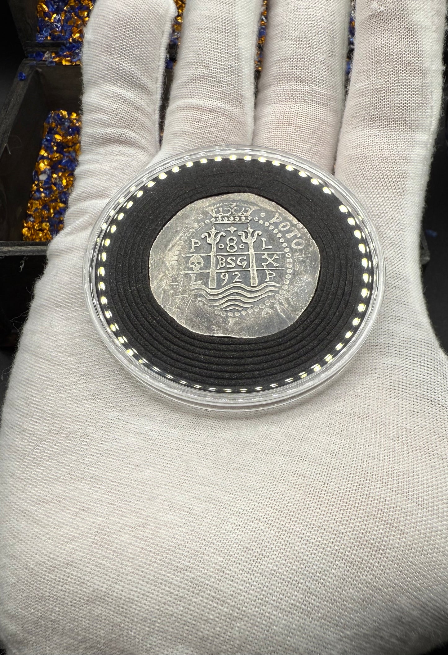 'Potosi Pillars & Waves Spanish Cob' Pirate Treasure Hand Crafted by Peculiar Coins 27 Gram .999 Fine Silver Round Pirate Design Antique Finish Includes Wood Treasure Chest, Capsule & COA Mint Condition