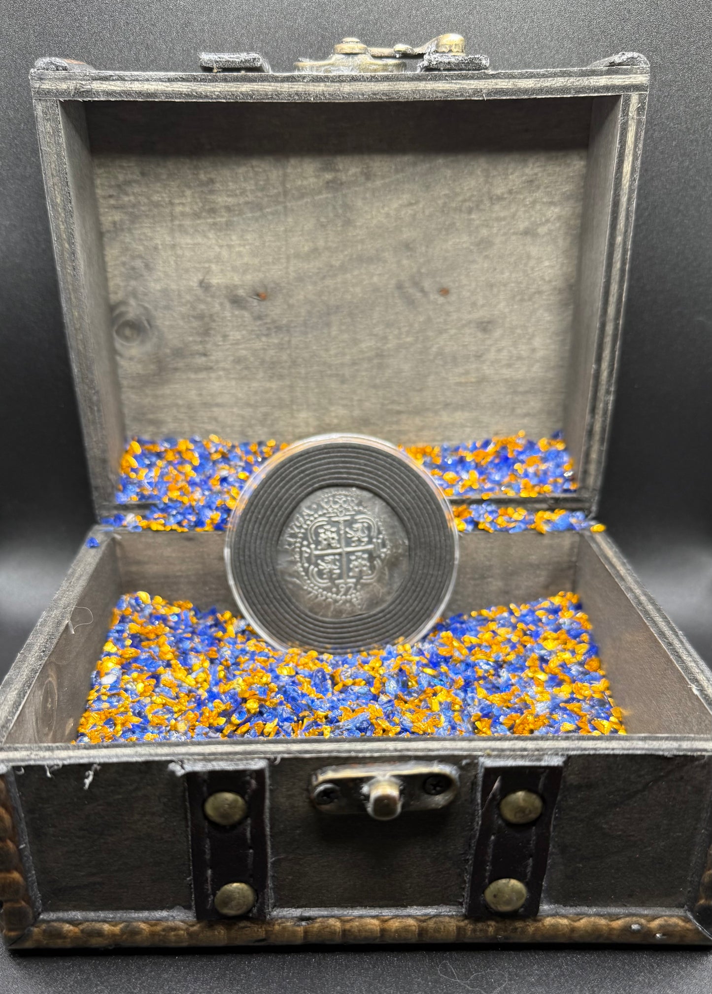 'Potosi Pillars & Waves Spanish Cob' Pirate Treasure Hand Crafted by Peculiar Coins 27 Gram .999 Fine Silver Round Pirate Design Antique Finish Includes Wood Treasure Chest, Capsule & COA Mint Condition