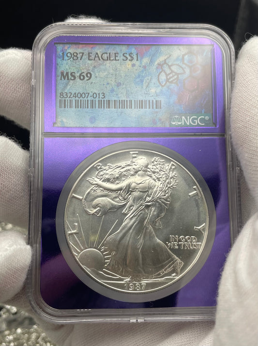 1987 $1 American Silver Eagle NGC MS69 Rare Purple Holder Trader Bea Private Issue