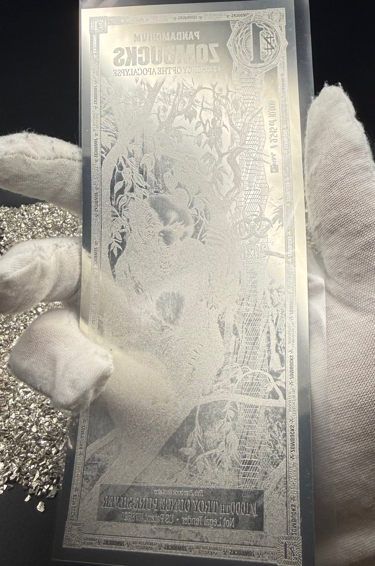 1/1000 OZT PANDAMONIUM ZOMBUCK WORLD SILVER AURUM NOTE & SLEEVE MINT (S/N 9,545)