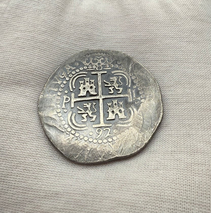 'Potosi Pillars & Waves Spanish Cob' Pirate Treasure Hand Crafted by Peculiar Coins 27 Gram .999 Fine Silver Round Pirate Design Antique Finish Includes Wood Treasure Chest, Capsule & COA Mint Condition