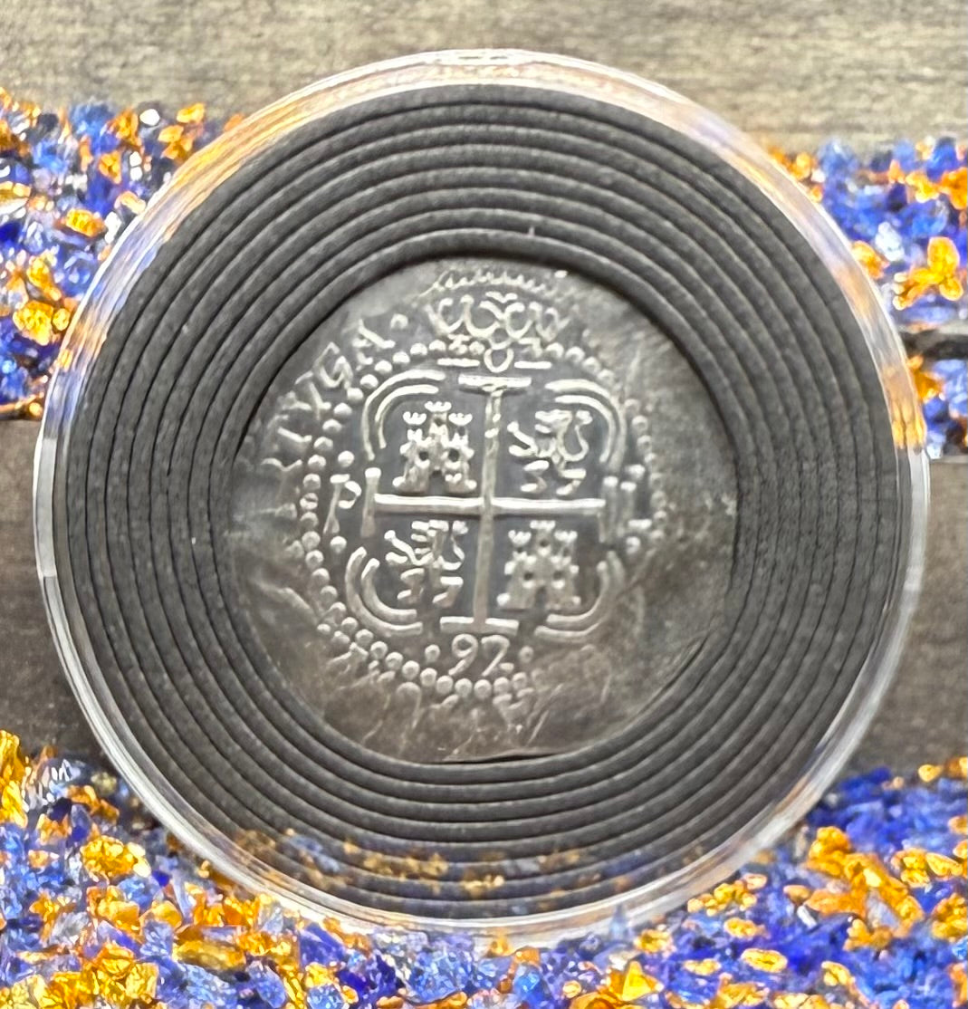 'Potosi Pillars & Waves Spanish Cob' Pirate Treasure Hand Crafted by Peculiar Coins 27 Gram .999 Fine Silver Round Pirate Design Antique Finish Includes Wood Treasure Chest, Capsule & COA Mint Condition