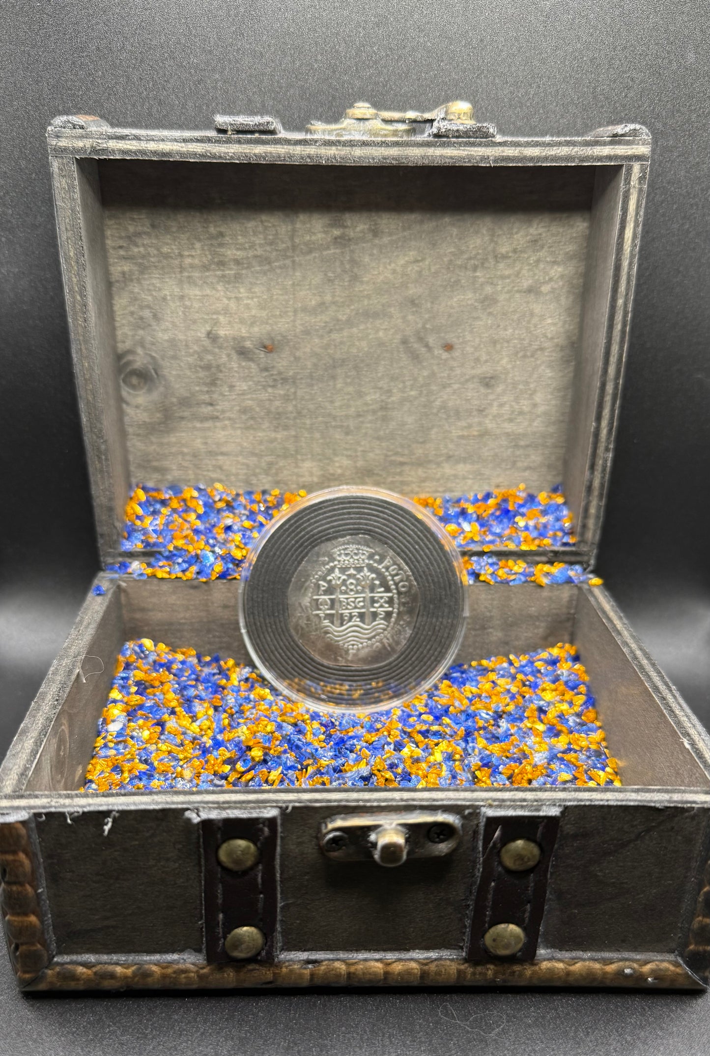 'Potosi Pillars & Waves Spanish Cob' Pirate Treasure Hand Crafted by Peculiar Coins 27 Gram .999 Fine Silver Round Pirate Design Antique Finish Includes Wood Treasure Chest, Capsule & COA Mint Condition