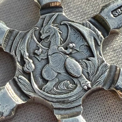 Pokémon 'Charizard Star' 1.08 oz .999 Fine Silver Star Hand Crafted by St Bee's in England, Shiny Finish, Includes Poké Ball & COA, Mint Condition, Limited Edition